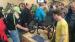 Admirers of recumbent tricycles at Spezi trade show in Germany