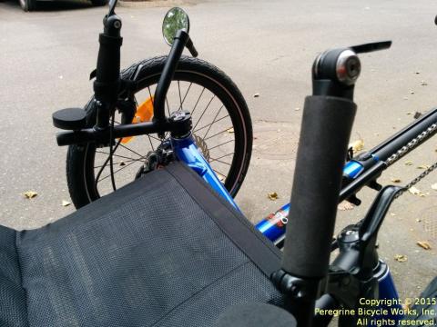 Silicone foam grips installed on a Catrike recumbent trike hold the cable housing close to the handlebar and have a smooth transition at each end